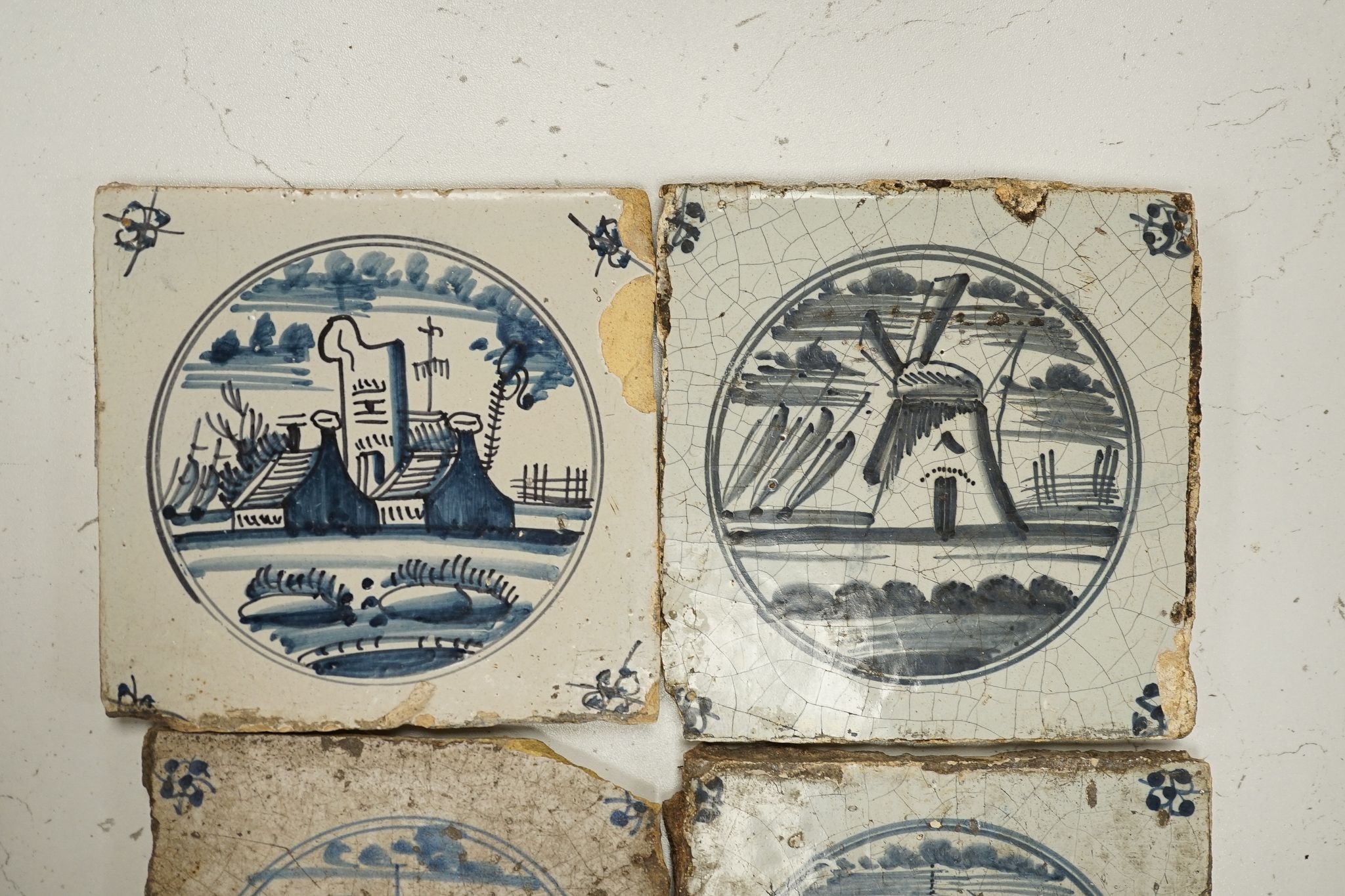 Eight various 18th and 19th century Delft tiles, 13cm